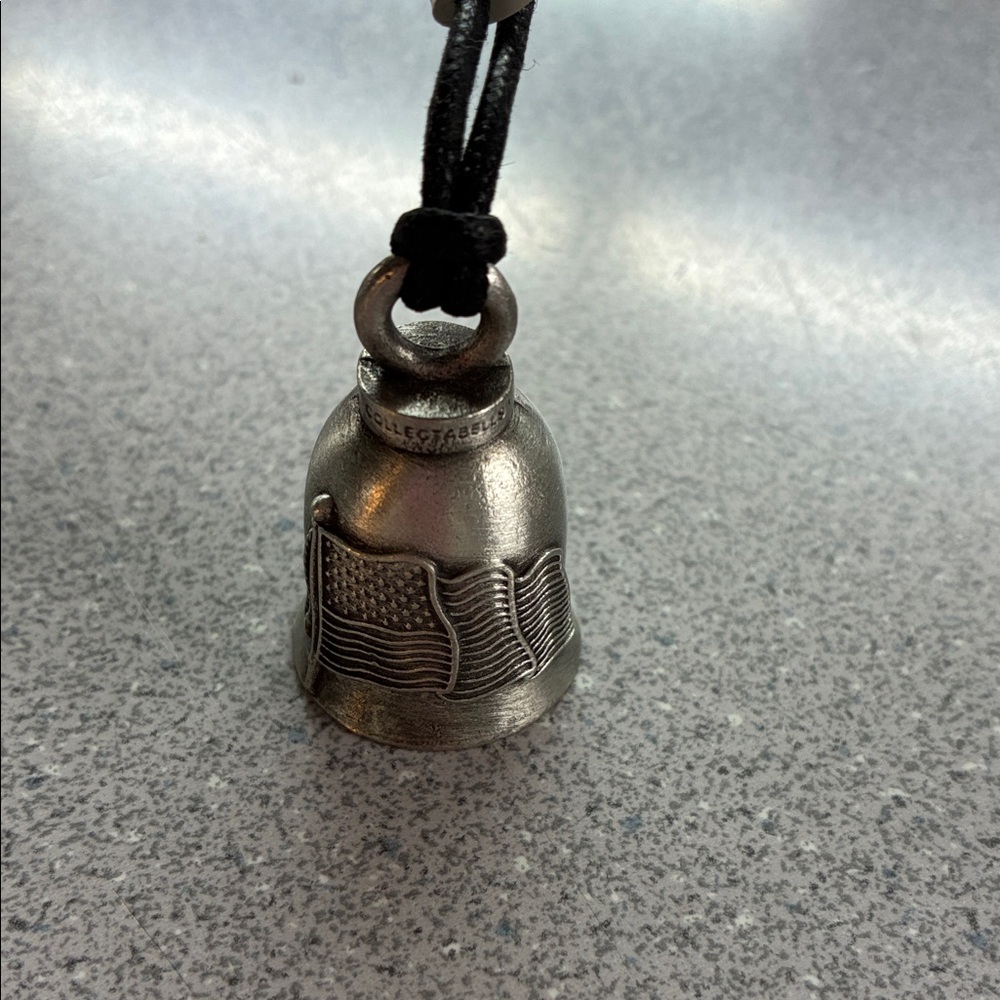 Silver Motorcycle Bell Pendant with American Flag Design